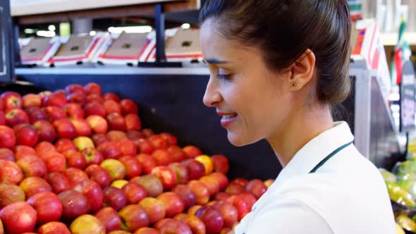 Female staff working at organic section