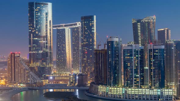 Buildings on Al Reem Island in Abu Dhabi Day to Night Timelapse From Above