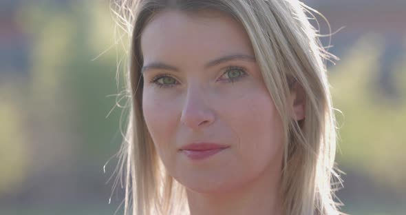 Front Close Up of Caucasian Woman Beautiful Young Human Face with Pale White Skin and Blonde Hair