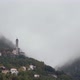 Church on a Mountain Surrounded By Clouds on Lake Como - VideoHive Item for Sale