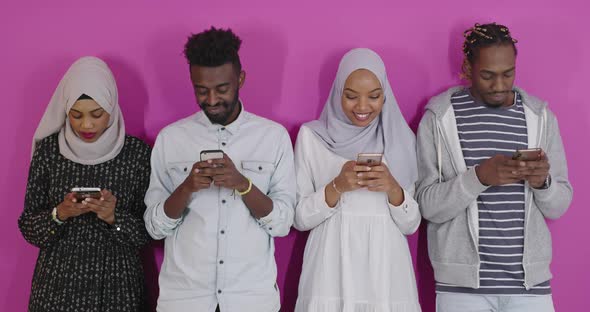 African Students Group Using Smart Phones Over Colorful Background