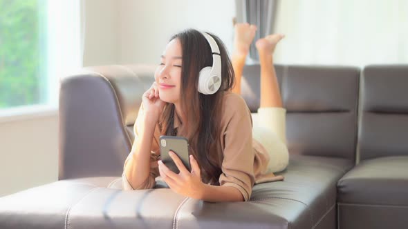 Woman use smart phone for listen music