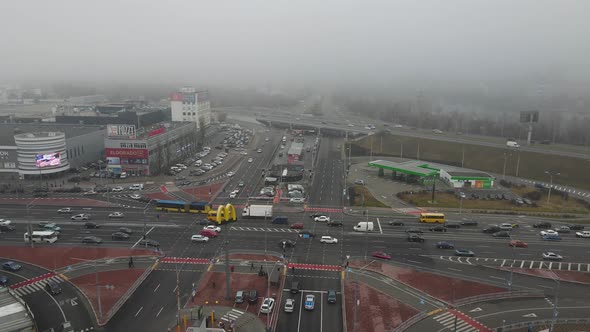 Top Shot of City Busy Traffic with Foggy Background