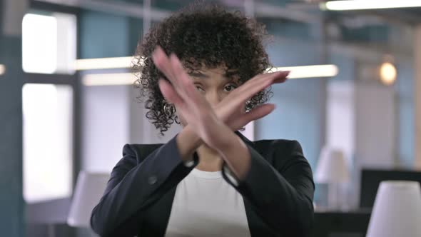 Portrait of African Businesswoman Saying No with Hand Gesture