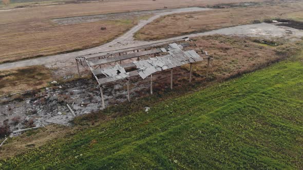 Abandoned and Destroyed Farm in the Countryside Due To the Financial Crisis. Aerial View