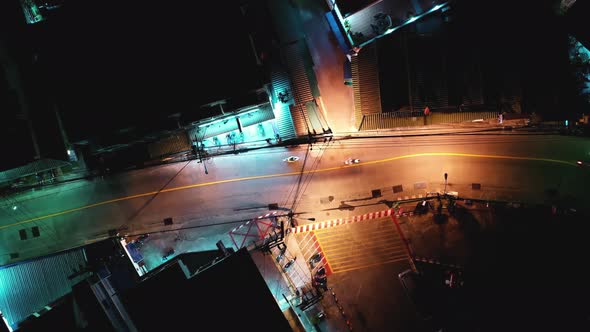 Traffic at Night. Cinematic urban aerial. Scooter Motorbike traffic. Aerial drone night video. Night