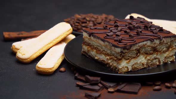 Portion of Traditional Italian Tiramisu Dessert Coffee Beans and Savoiardi Cookies