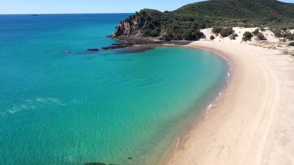 Remote white sand beach with turquoise tropical water aerial on Great Keppel Island, Yeppoon, Queens