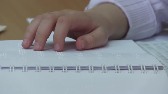 Blind Girl Reading Braille