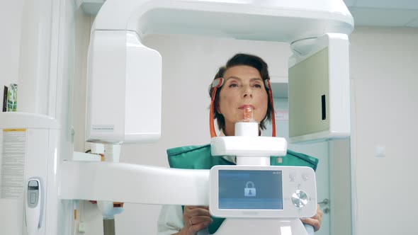 A Woman is Having a Dental Xray