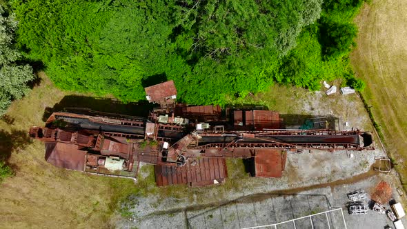 Abandoned bucket wheel excavator drone video