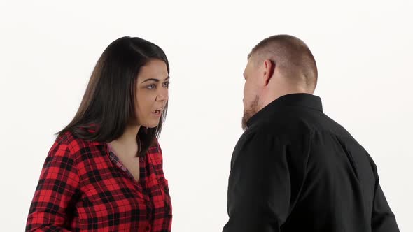 Angry Woman Is Arguing with Her Man and Slaps Him