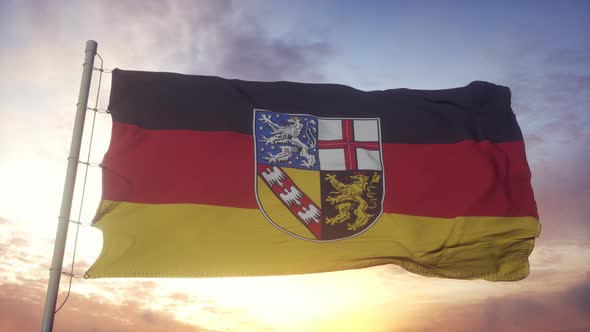 Saarland Flag Germany Waving in the Wind Sky and Sun Background