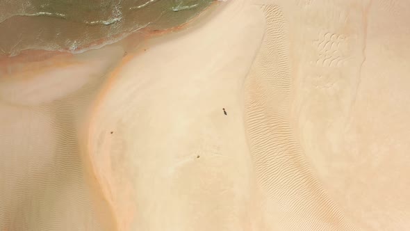 Aerial View of a Gleaming Clean Golden Beach