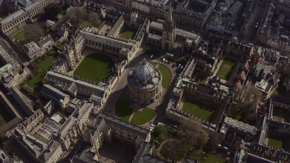 High circling drone shot of Bodleian Library Radcliffe camera building Oxford