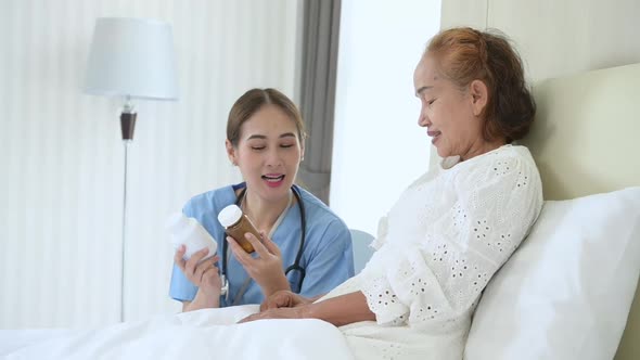 A doctor is discussing taking medication to an elderly patient