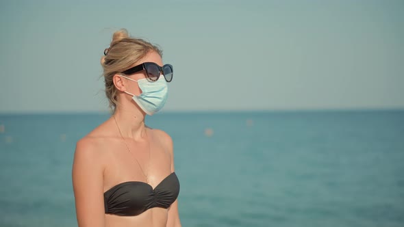 Woman Walking In Protective Mask COVID19 Virus On Vacation Holiday. Tourist Trip In Face Mask.