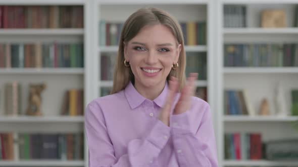 Portrait of Happy Woman Clapping Applauding