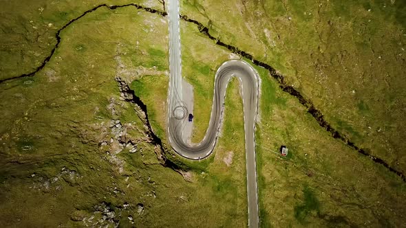 Aerial View of a Winding Road Scenic Road Two Car Arriving in the Same Time