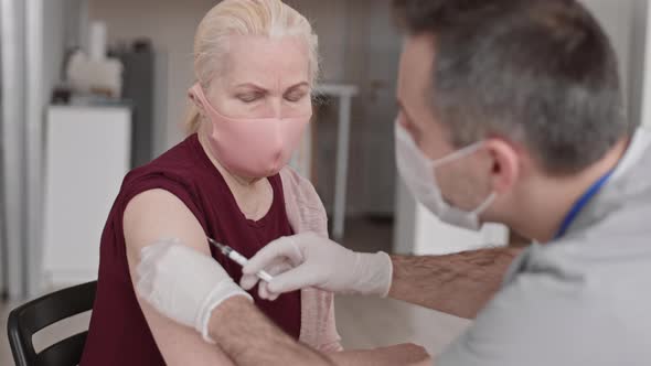 Senior Woman Getting Flu Shot