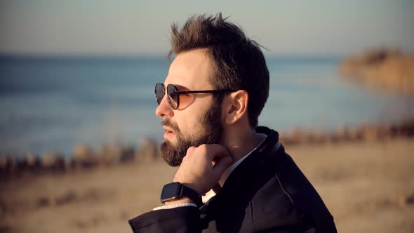 Stylish Macho In Jacket Taking Break After Hard Business Decision.Confident Well-Dressed Man Smoking