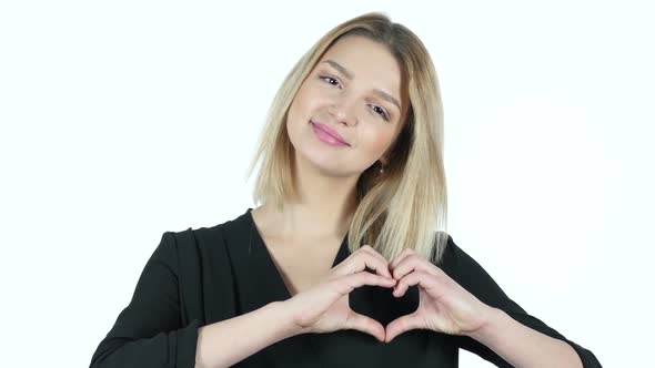 Handmade Heart Sign by Young Woman, White Background