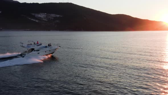 Fast moving motor yacht at the sea.