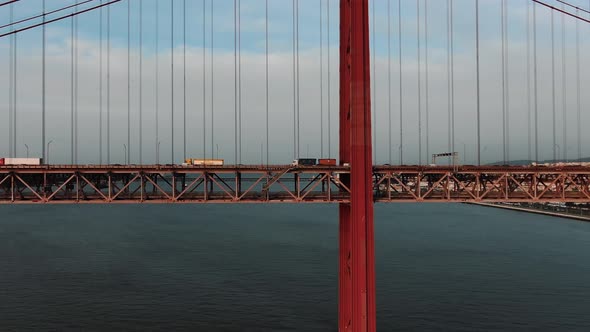 Vehicles Drive Along Famous Bridge Over Tagus River Aerial