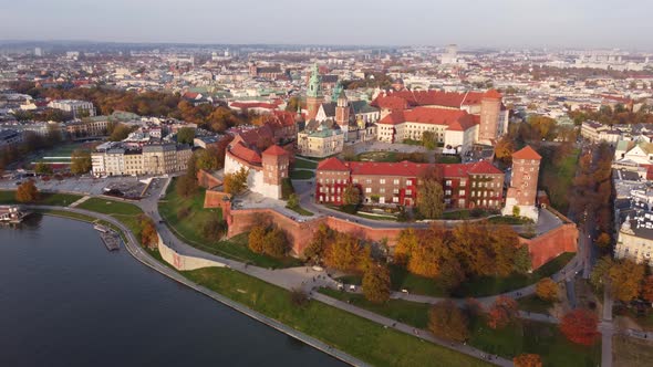 Establishing Drone Shot of Wawel Royal Castle in Krakow, Golden Hour.