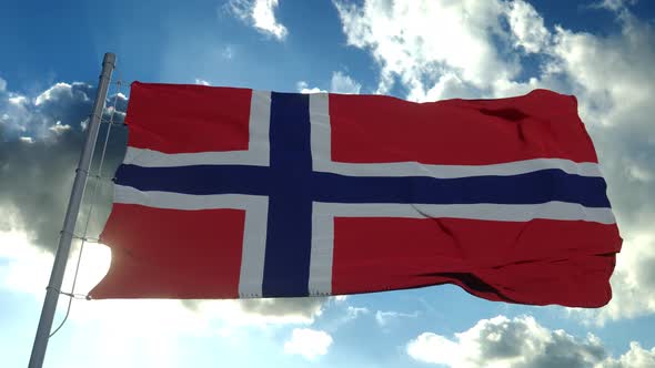 Norway Flag Waving in the Wind Against Deep Blue Sky