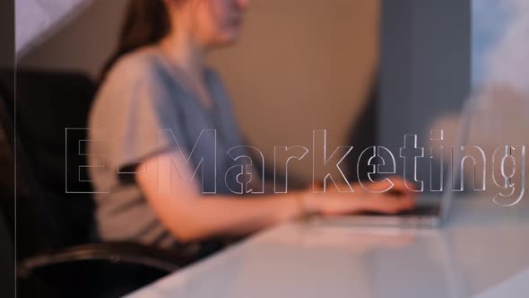 Woman Working in E-marketing Department