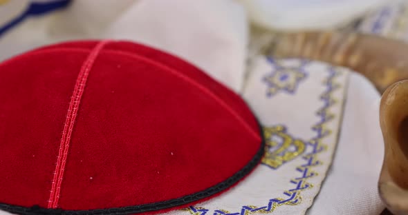 Jewish Orthodox Prayer Items Kippa on a Shofar Torah Scroll