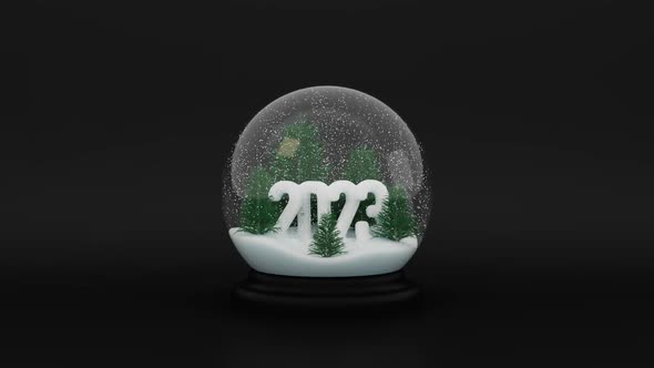 Glass Snow Ball with 2023 Pine Trees and Falling Snow Inside on Dark Backdrop