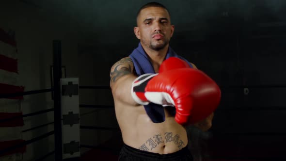 Man Looking Aggressive With Boxing Gloves 22