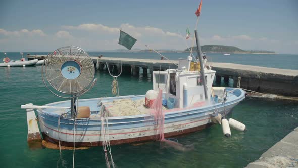 Old Fishing Vessel with Drift Nets Parked Near Pier and Floating on Waves, Hobby