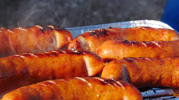 Sausages Grilling on Gas Grill