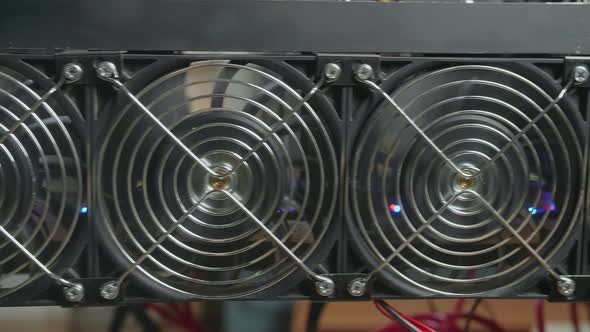 Close Up Fan Of Cryptocurrency Mining Rig Working