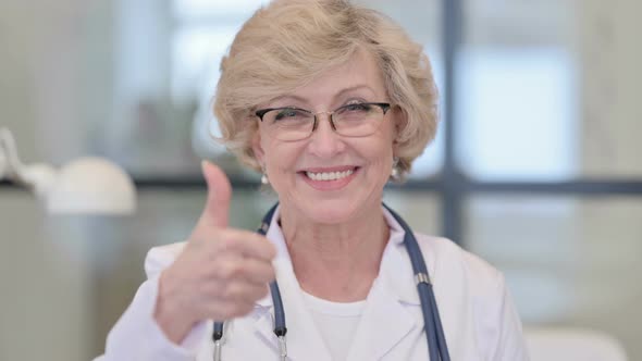 Portrait of Old Female Doctor Showing Thumbs Up