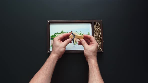 the Photographer Puts Wedding Photos and a Flash Drive in a Box