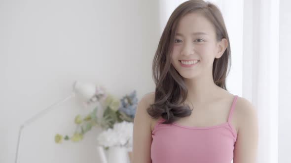 Beautiful closeup portrait young asian woman with smiling and laughing.