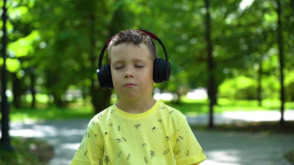 Boy listening to music with headphones