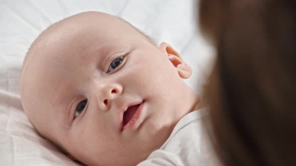 Sweet Baby Looking at Mom