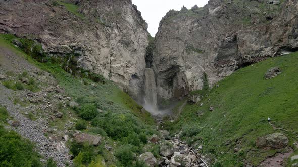 Dirty Waterfall Sultan High in the Mountains Near Elbrus in Summer