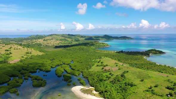 A Tropical Island with a Turquoise Lagoon and a Sandbank. Caramoan Islands, Philippines.