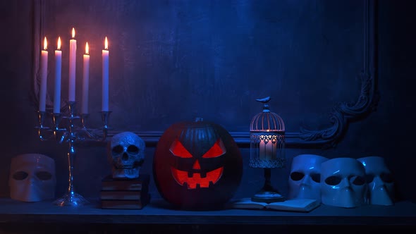 Scary laughing pumpkin and an old skull over the frightening gothic background.