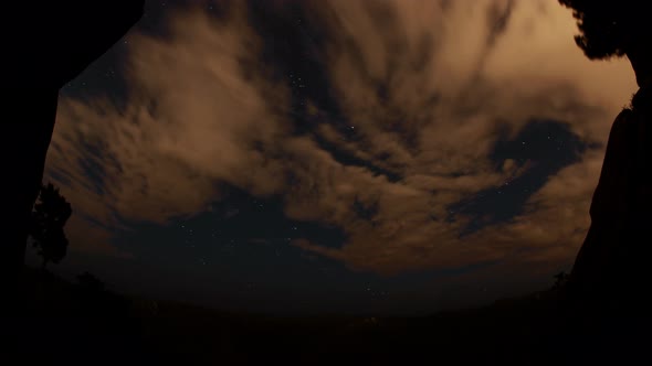 Timelapse of the Starry Sky Above the Mountain Peaks in the Siberian Forest. Krasnoyarsk Nature