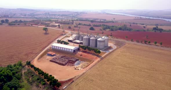 Aerial image of factories with grain storage silos. Aeration and export storage.