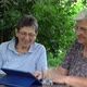 Seniors In The Garden Looking At Tablet - VideoHive Item for Sale