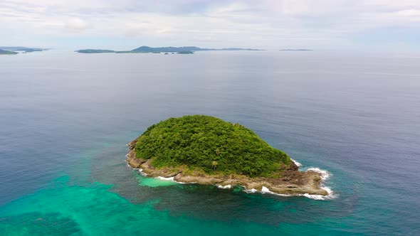 Tropical Island on Coral Reef Top View