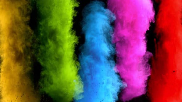Super Slowmotion Shot of Color Powder Explosions Isolated on Black Background alt